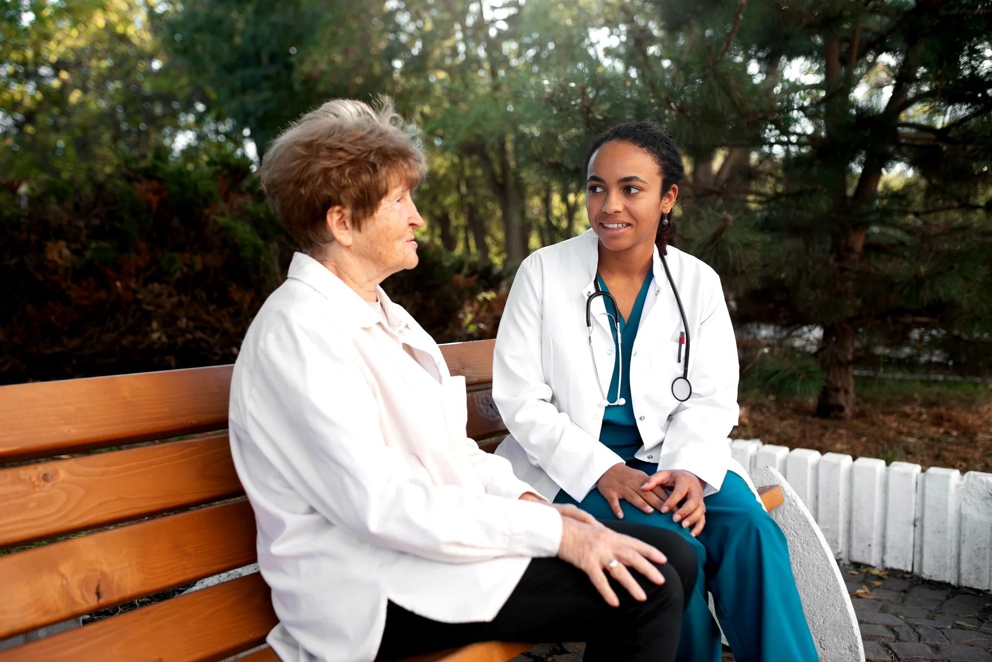 nurse talking with an aged woman